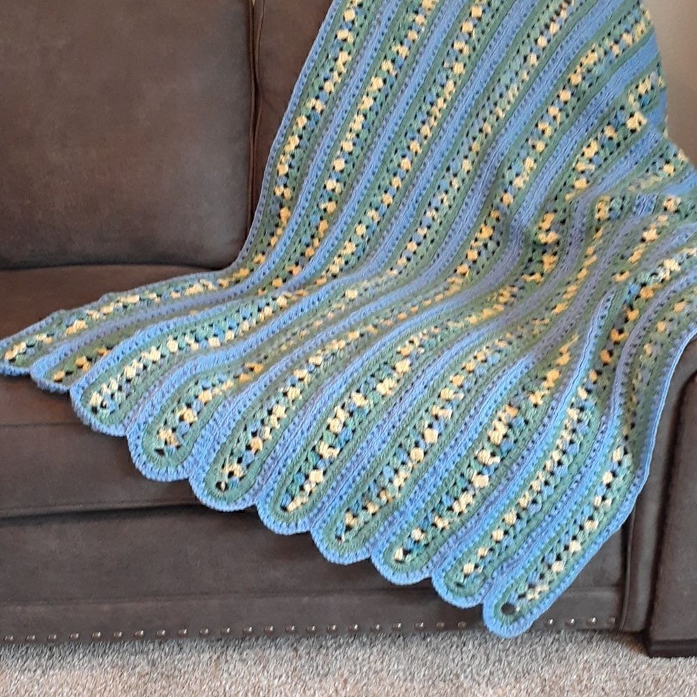 Hand crocheted blue and yellow scalloped edge 58" X 38" afghan throw